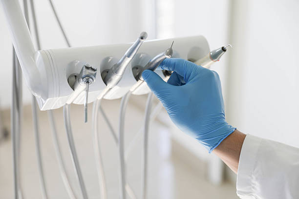 Professional Tooth Extraction technician working in Darien, GA